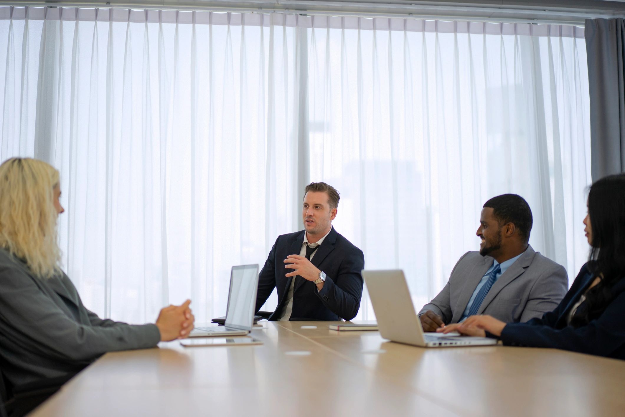 Property management team meeting with clients
